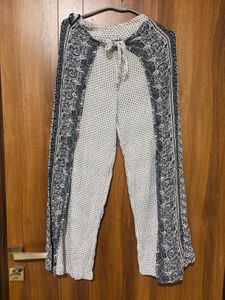white top with black trousers