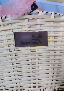 Charming Woven Basket with Pink Bow