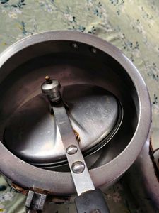 A silver pressure cooker