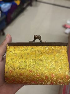 Cute little clutch to style your outfit