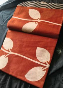 Beautiful Orange Saree with Leaf Print