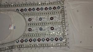 Elegant White Kurta with Intricate Embroidery