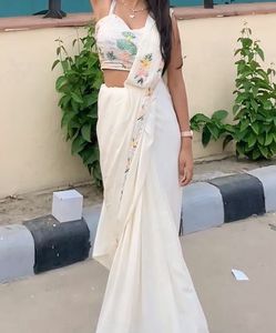 Elegant White Saree with padded Floral Blouse