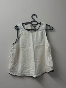 Westside Chic White Sleeveless Top with Black Trim
