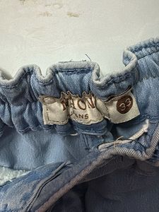 Light Wash Denim Capris with Heart Detail
