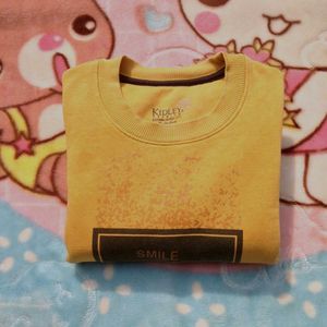 yellow sweatshirt