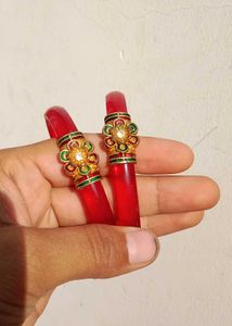 Elegant Red Bangles with Gold Accent