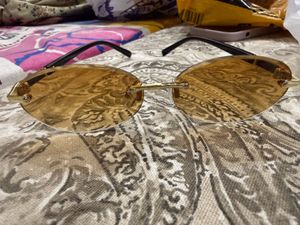 Oval Frameless Sunglasses