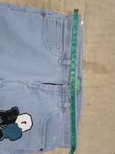 Light Blue Jeans with Graphic Patch