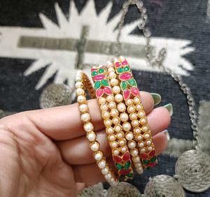 Elegant Pearl and Kundan Bangles Set