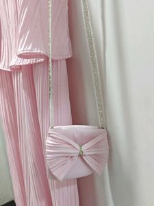 Pink Pleated Jumpsuit with Matching Bag