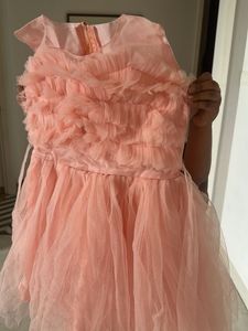 Girls Peach-Pink Ruffle Party Gown
