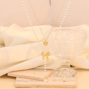 Layered Pearl Necklace with Heart &amp; Bow
