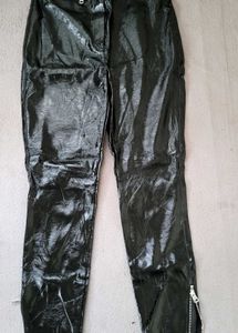 Shiny Black High-Waisted Pants and maroon top