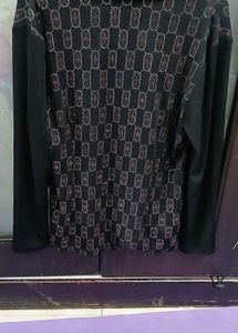 Chic Black Sweater with Embellishments