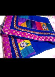 Elegant Blue Saree with Colorful Accents
