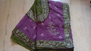 Embroidered green and purple Saree