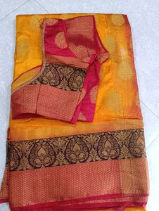 Vibrant Yellow Saree with Brocade Blouse