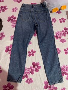 Ripped Blue Denim Jeans