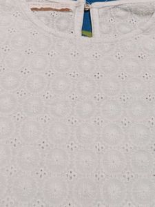 Elegant White Embroidered Peplum Top