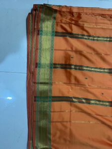 Orange Silk Saree with Gold Border
