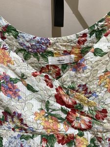 Floral Tie-Strap Peplum Top