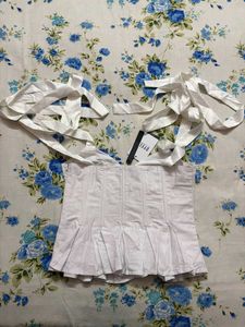 Elegant White Peplum Corset Top