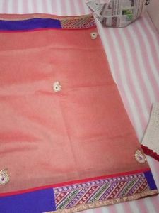 Elegant Peach Saree with Blue Border