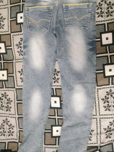 Stylish Blue Denim Jeans with Yellow Accent