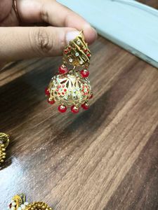 Elegant Jhumka Earrings with Red Beads
