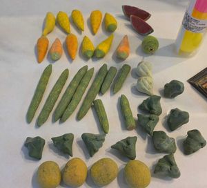picture cards, toy cars, tennis ball, ceramic toys