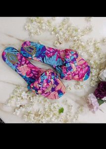 multicolored textured flats