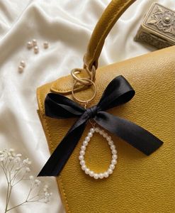 Elegant Pearl &amp; Bow Keychain Charm