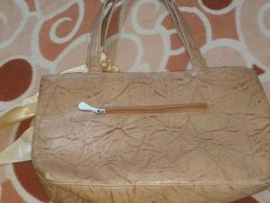 Stylish Tan Shoulder Bag with Scarf Accent