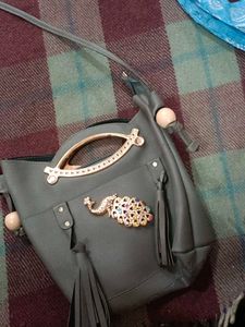Stylish Grey Handbag with Embellishments