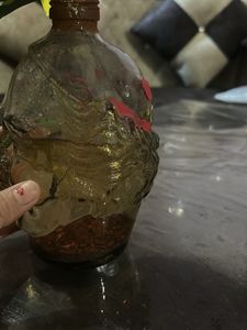 Unique Head-Shaped Vase with Yellow Flower