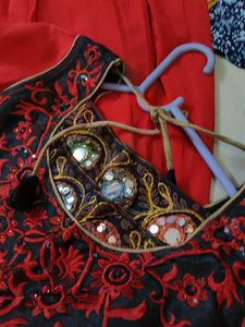 long embroidered kurta with mirror work