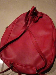 Red Backpack with Studded Pockets
