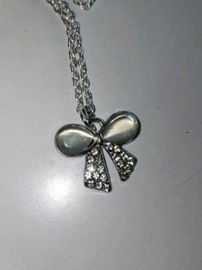Silver Tone Bow Necklace