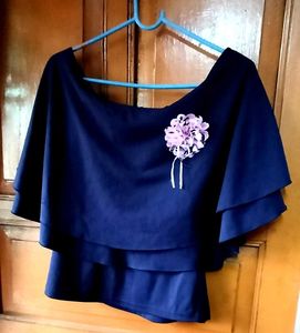 Elegant Navy Blue Tiered Blouse with Flower Accent