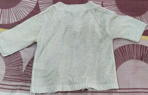 Cream with golden glitter shrug