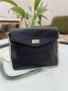 Leather Sling Bag.