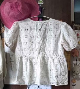 Chic White Eyelet Peplum Top