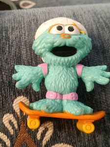 Sesame Street Monster Toy on Skateboard