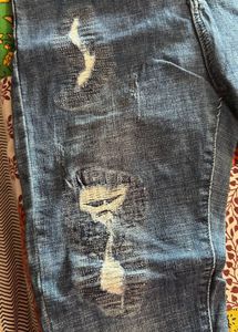 Embroidered Ripped Blue Jeans