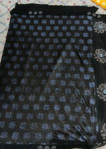 Elegant Black Saree with Blue Floral Print