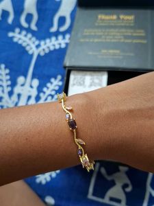Elegant Gold-Tone Bracelet with Gems