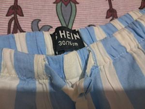 striped blue and white trousers