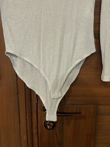 Beautiful light blue striped bodysuit