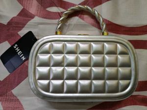 Silver Quilted Box Clutch with Twisted Handle